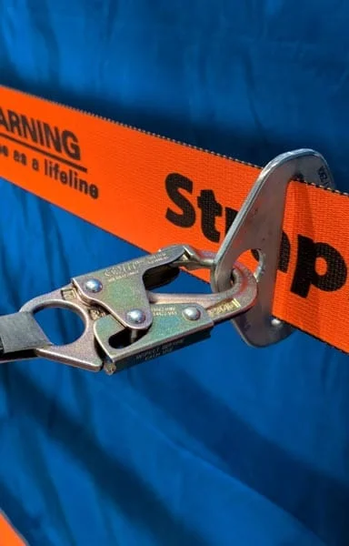 Rear view of HitchRail installed on a pickup truck hitch.